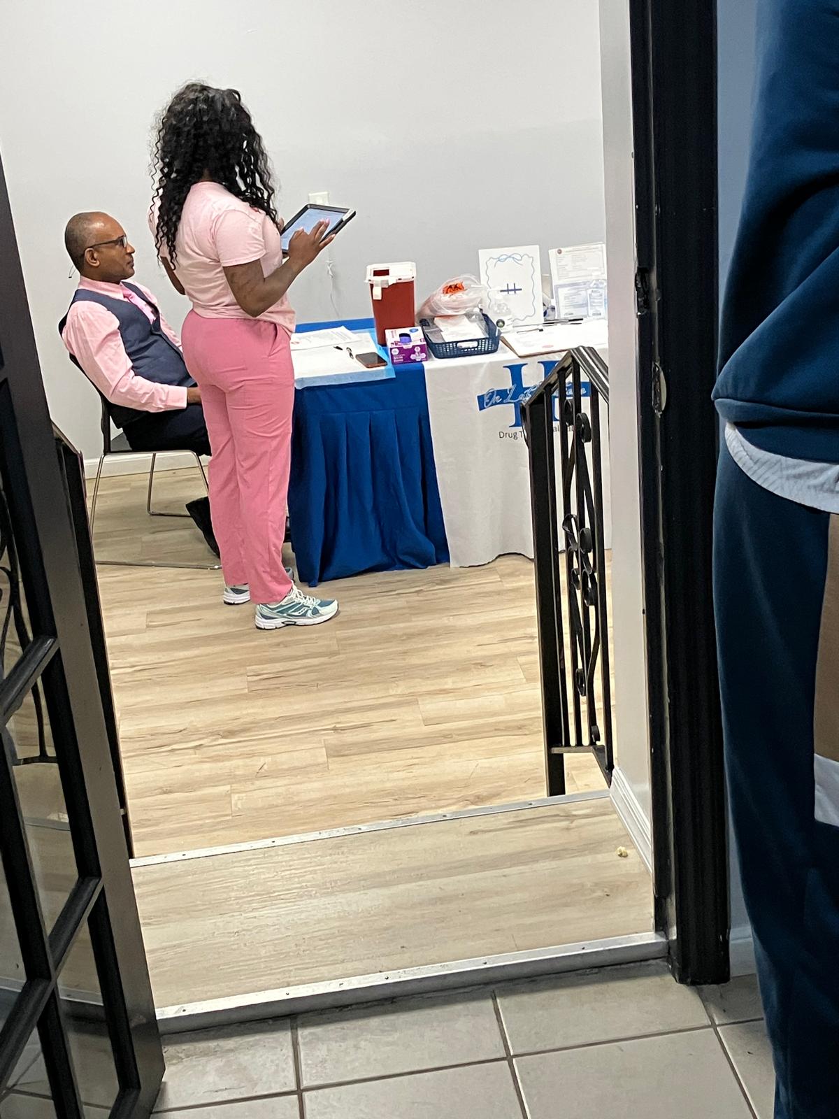Handz On Lab Solutions clinician conducting patient intake